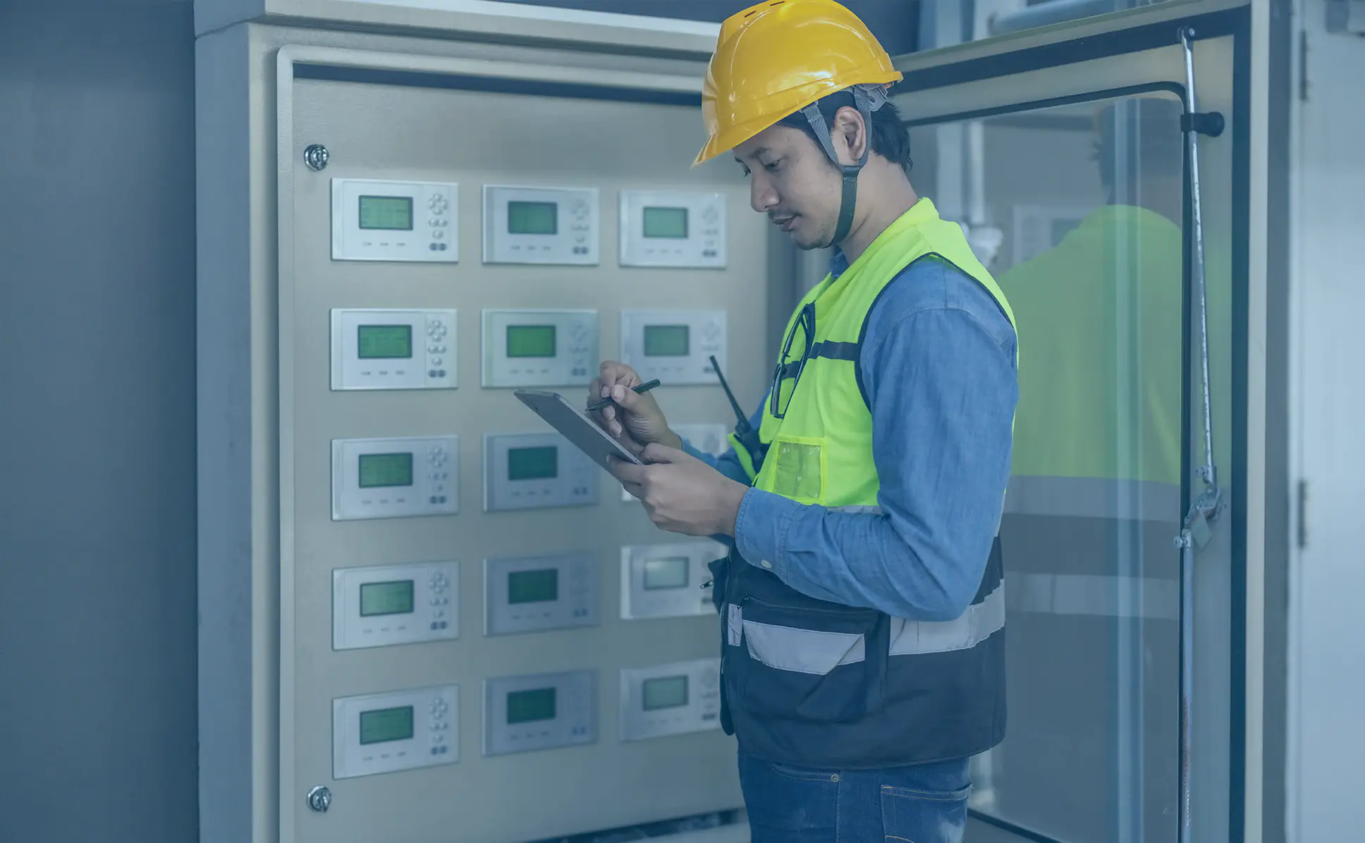 HVAC Control system checking and inspecting control panel by technician