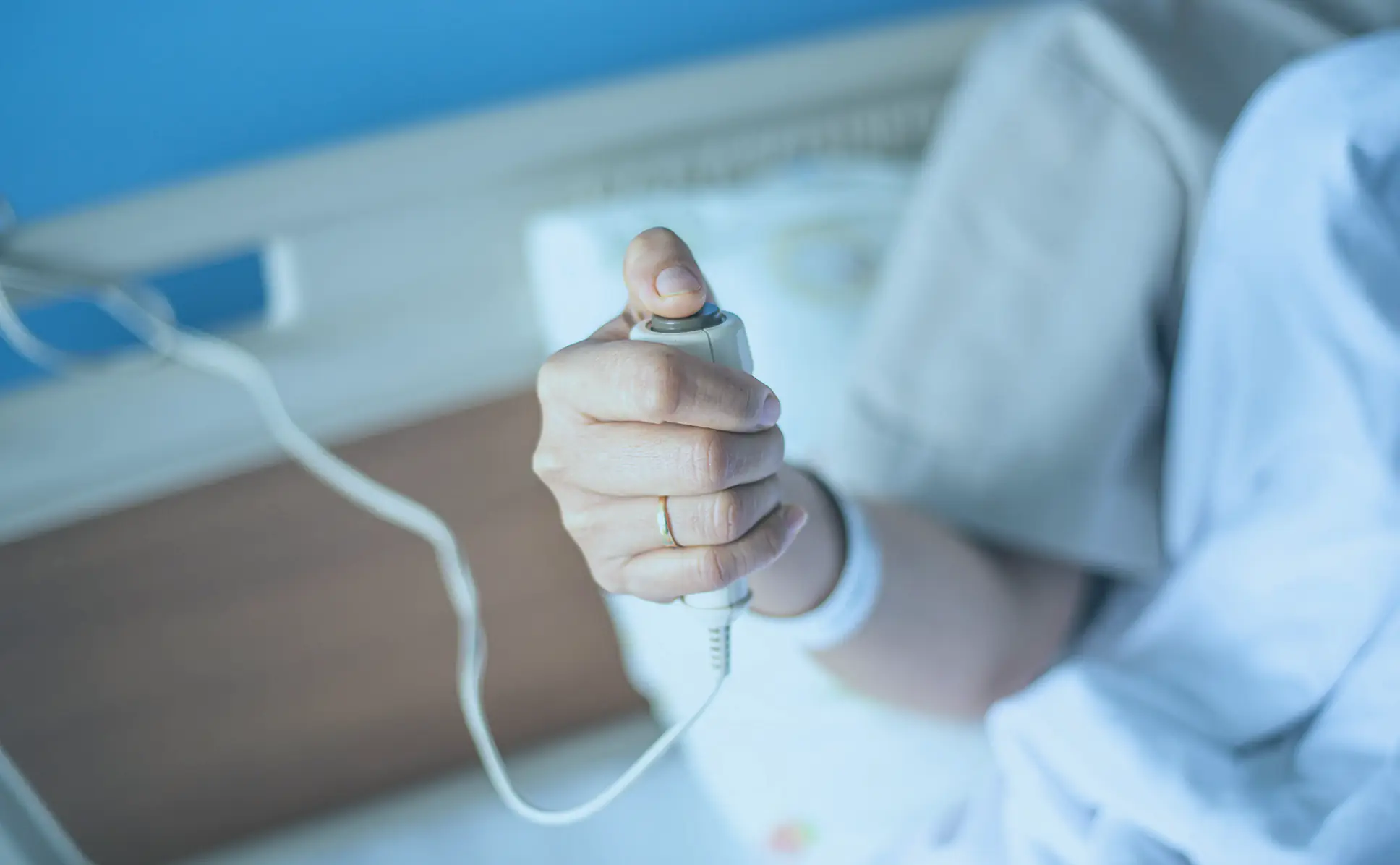Nurse Call patient-pressing-nurse-call-button-holding-help-emergency-health-care